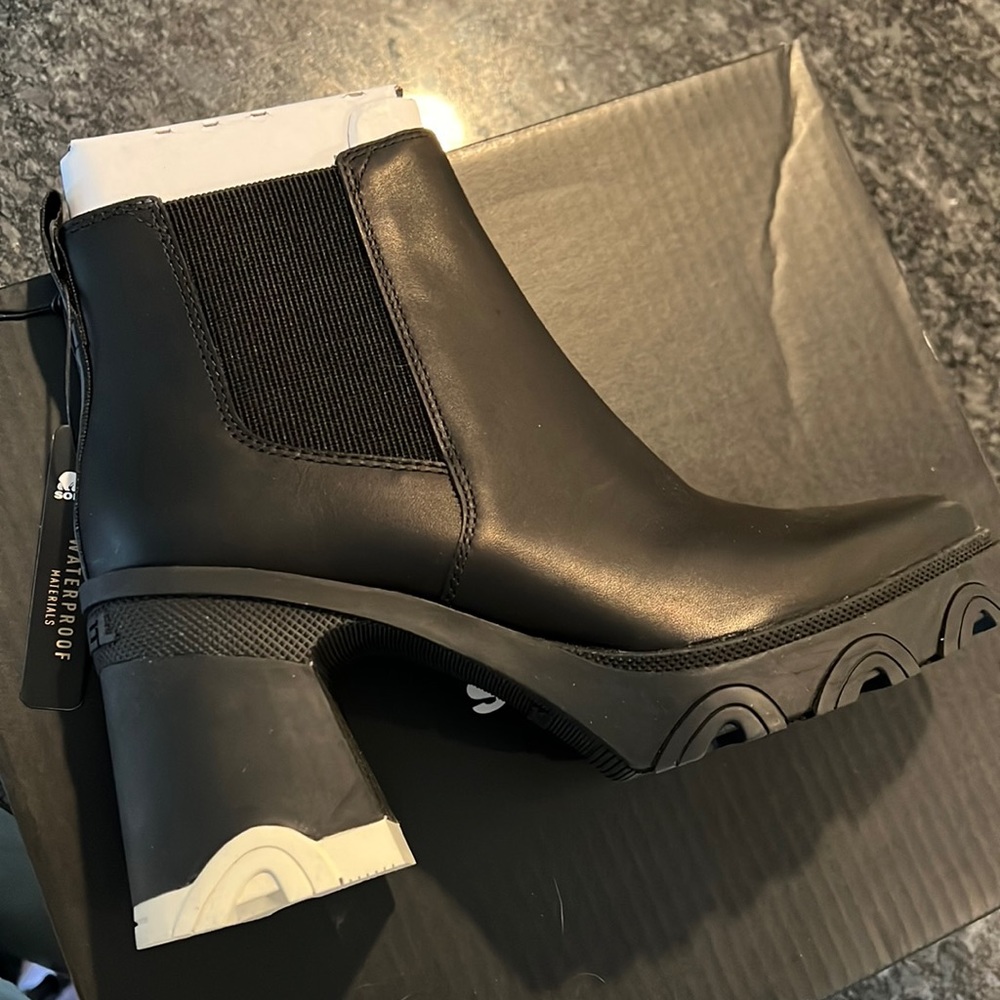 Sorel Black Ankle Booties with White Heel Accent